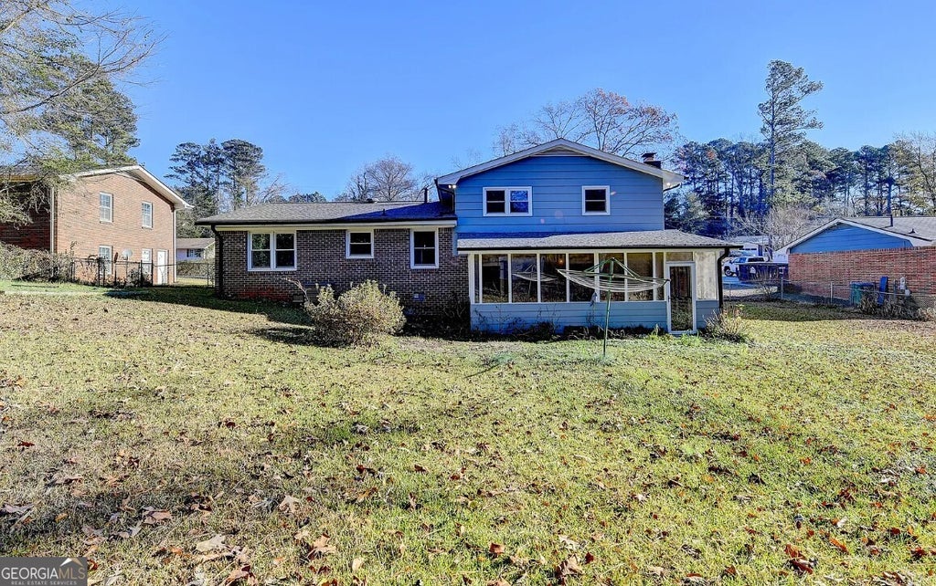 Photo of 1249 SW Renee Dr SW, Lilburn, GA 30047 (MLS # 10793776)