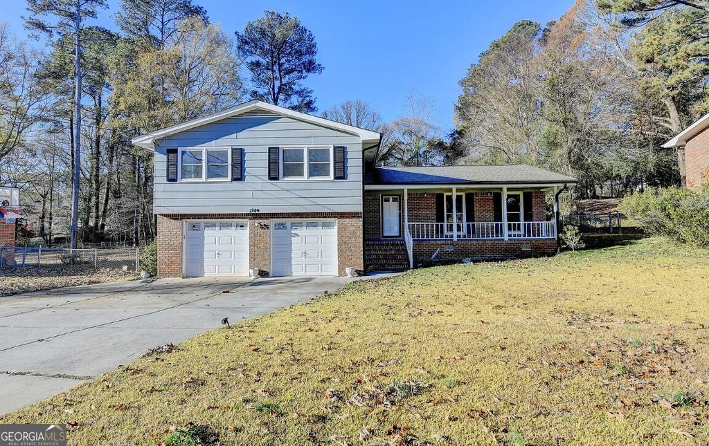 Photo of 1249 SW Renee Dr SW, Lilburn, GA 30047 (MLS # 10793776)