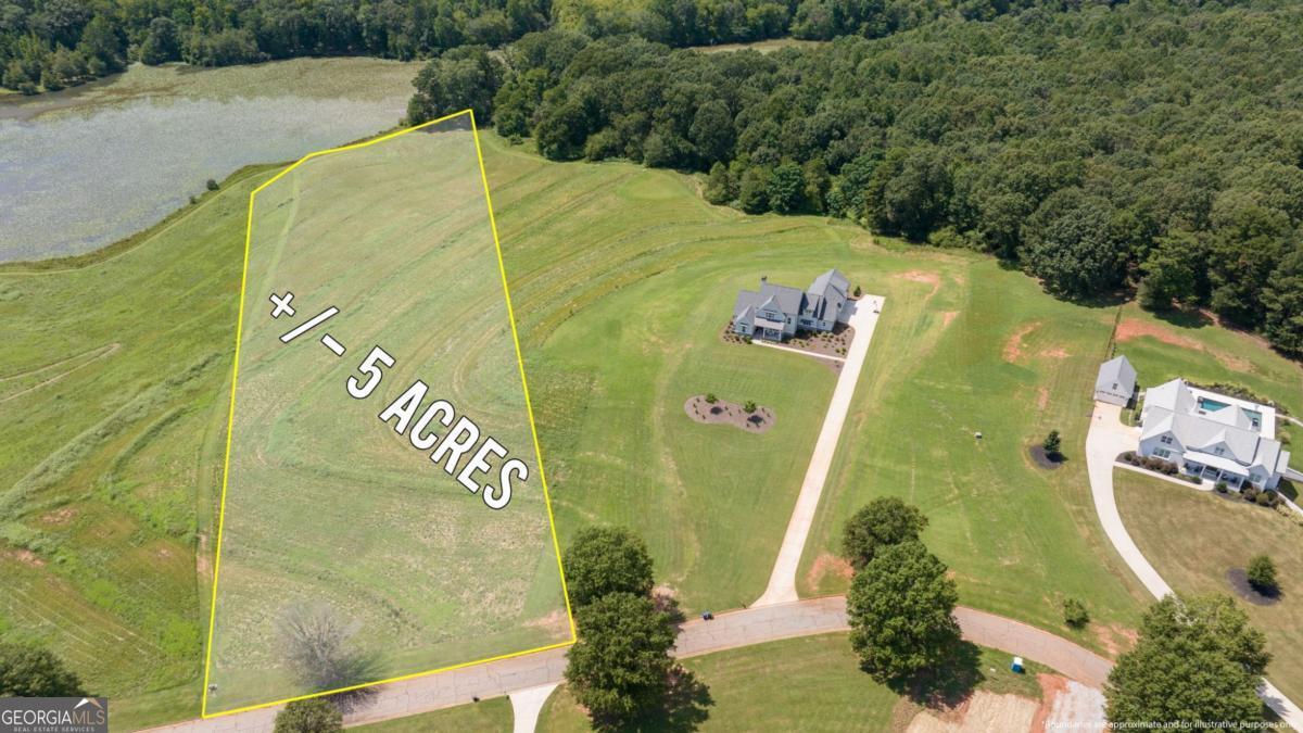 Beautiful 5-acre tract in a private, gated community in one of Monroe's most desirable areas. This property offers stunning lake views and the perfect setting to build your dream home. Enjoy the peace and privacy of a spacious lot while still being close to all that Monroe has to offer. Buyers have the option to build on this parcel or purchase together with the neighboring home that is also available for sale. This is a rare opportunity to own land in this sought-after location.