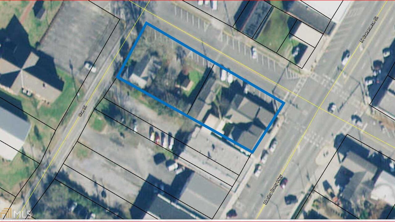 MAJOR PRICE IMPROVEMENT! 13 apartment units and 1 house located in the heart of Summerville, Georgia. Units are leased on monthly, bi-weekly and weekly schedules and provide monthly income ranging from $225 to $480 per month. The house sits at the rear of the apartments and is 1570 sq feet. Along with the units and house, there is a garage and several storage units. The property is located across from City Hall, mere walking distance to restaurants, banks, drugstores and additional retail locations. The owner lives in the house and pays no rent. The new buyer could easily lease the house for $550 to $660 per month.