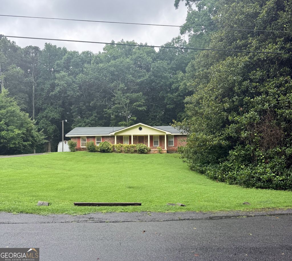 Photo of 1501 Lucelle Avenue, Stone Mountain, GA 30087 (MLS # 10805966)