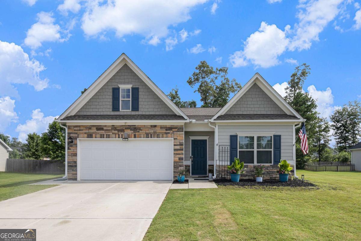 Welcome to this beautifully updated 3-bedroom, 2-bath ranch home built in 2021! Featuring a spacious open-concept layout, this home offers a stunning kitchen with white cabinets, granite countertops, stainless steel appliances, and a large breakfast bar-perfect for entertaining. Enjoy relaxing mornings or evening gatherings on the covered back patio. With modern finishes throughout and single-level living, this move-in ready home offers comfort, style, and convenience all in one.