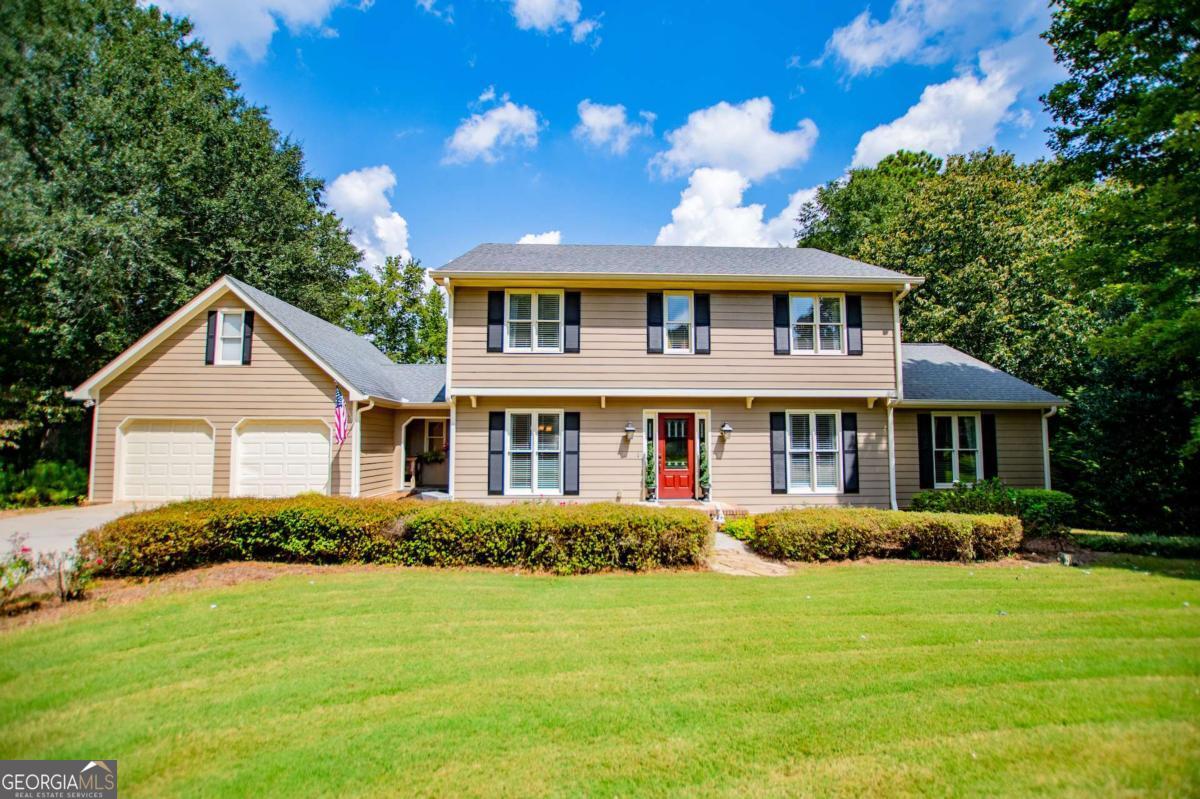 This is an incredibly rare find in the Central School district. This gorgeous traditional has 2 owner suites, one upstairs and one on the main level. The suite on the main level has a private den and bath with tiled shower and walk in closet. The main level also features a formal dining, cozy den with wood burning or gas log fireplace, and kitchen with beautiful wood cabinetry. There is a finished bonus room over the garage with heating and cooling as well. Upstairs, you'll find a second owner's suite with private bath plus 3 more bedrooms and another full bath. There are 2 water heaters, 40 & 50 gallon, tied together so you'll never run out of hot water. Now, let's talk about the living space outside. The expansive back deck overlooks the 20x40 PebbleTec saltwater pool. This pool are is fenced with grounds that are like a well manicured park. There is a second fenced area for pets. The exterior siding is LP smart siding and installed in 2007 and repainted in 2020. Yard is professionally maintained, and it shows! This is a true showplace that you have to see to appreciate.