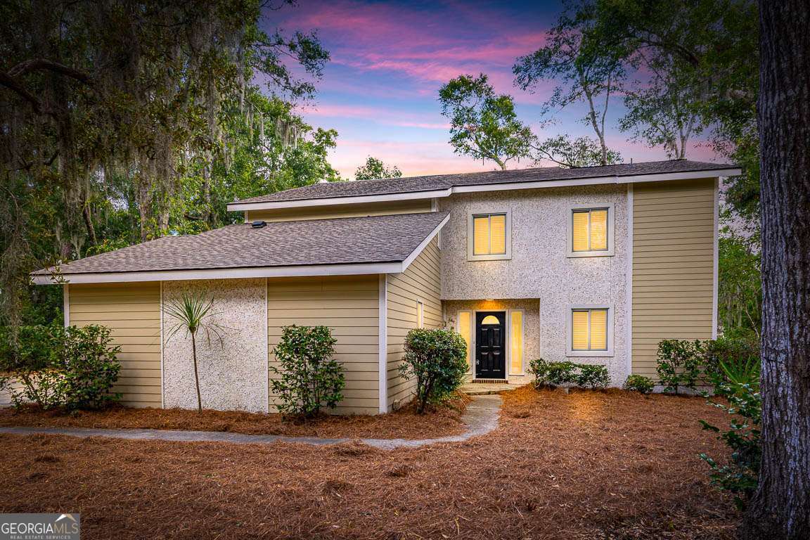Brand new to the market in Sea Palms! This beautifully updated home, on the golf course, blends loads of great features with modern comfort. The heart of the home is the updated kitchen with sleek counters, tile backsplash, Bosch appliances, and new cabinetry. Elegant fixtures and high ceilings bring light and style throughout. The spacious primary suite features an updated bath with dual vanity, soaking tub, separate shower, generous closet space, and natural light. Enjoy your sunroom/porch (not in heated/cooled sqft) overlooking the LARGE fenced backyard backing up to the fairway. On .6 acres, there's room for a pool, pavilion, or outdoor kitchen...make it your own. Other upgrades over the last few years include HW heater, heat pump, flooring, and more. Note: 3rd and 4th bedrooms are currently combined, but easily converted back-see virtual tour for floorplan. Located just minutes from SSI's beaches, shopping, and dining in a sought-after golf course community!