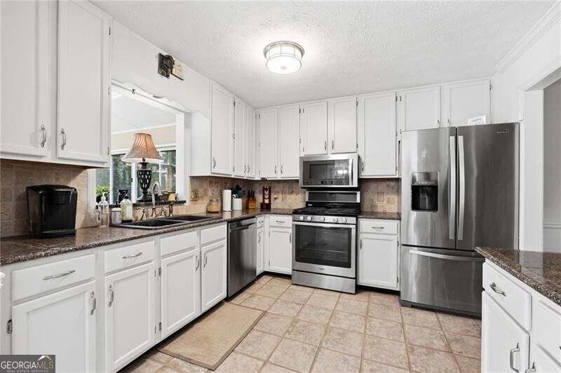 Photo of 4758 Shallow Ridge Road NE, Kennesaw, GA 30144 (MLS # 10857672)