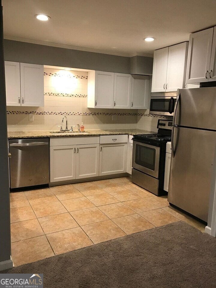 Photo of 3101 Colonial Way, Atlanta, GA 30341 (MLS # 10795950)