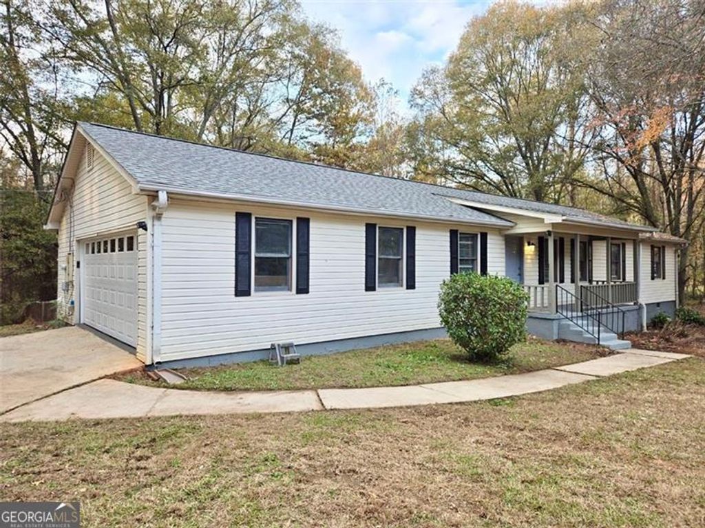 Photo of 7275 HERNDON Rd, Fairburn, GA 30213 (MLS # 10657782)