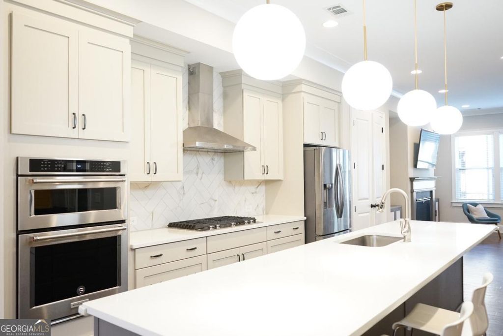 Photo of 6588 Aria Village Drive, Atlanta, GA 30328 (MLS # 10725173)