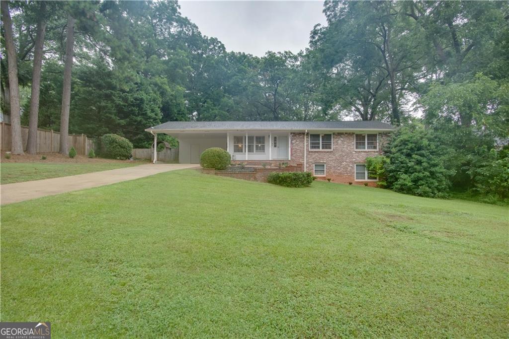 Charming Renovated Brick Home in Historic College Park. Welcome to this beautifully renovated brick home nestled in the heart of the sought-after Historic College Park community. Enjoy a spacious family room perfect for relaxing or entertaining, a well-appointed kitchen with abundant storage, and a separate dining area ideal for gatherings. Step outside to a stunning screened-in porch that overlooks a large, private, fenced backyard-your own peaceful retreat. The generous owner's suite boasts a fully renovated en-suite bathroom. Two additional secondary bedrooms share an updated hall bath. The finished basement offers a versatile living area, an additional bedroom, and ample storage space. Conveniently located near all major Atlanta highways, Hartsfield-Jackson Airport, Delta, Porsche, Tyler Perry Studios, and Woodward Academy, this home combines comfort, charm, and an unbeatable location.