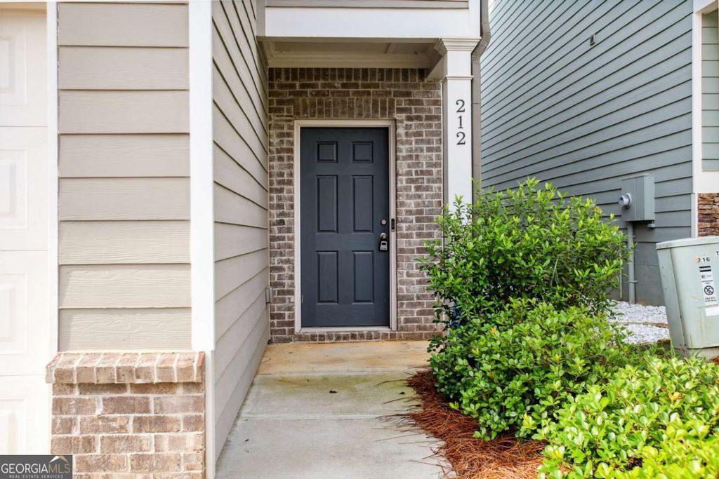Photo of 212 Ridge Valley Dr, Woodstock, GA 30189 (MLS # 10758430)