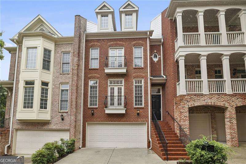 Exceptional Opportunity to own in highly sought after Weatherstone at LaVista. This executive-style townhome offers four spacious levels designed for luxurious, comfortable living. The main floor showcases an open, light-filled layout with a formal dining room, generous family room featuring custom built-ins, a gas fireplace, and beautiful hardwood flooring throughout. The chef's kitchen seamlessly overlooks the family area and is equipped with stainless steel appliances, granite countertops, custom cabinetry, a breakfast bar, pantry, and ample workspace-perfect for both casual meals and entertaining guests. Upstairs, the primary suite features a double vanity, whirlpool tub, and walk-in shower, while two additional oversized bedrooms each provide their own walk-in closets, attached full baths. The lower terrace level includes an additional large bedroom or bonus room, ideal for use as a media room, in-law suite, or home office. Throughout the home, you'll find abundant storage and a two-car garage with workspace. Two outdoor living spaces include a large deck and terrace level patio that overlook private green space. This gated community boasts a park-like setting complete with a gazebo, walking paths, green space for pets and guest parking. Just steps away, the vibrant Toco Hills Shopping Center offers grocery stores, retail shopping, popular dining options, and a gym. Enjoy a prime intown location less than two miles from Emory Medical, Emory University, Children's Healthcare, the VA Hospital, and the CDC, with easy access to Decatur, Buckhead, Midtown, and more. Recent updates in 2024 and 2025 include exterior and interior paint, refinished hardwoods, new carpet and restored deck.