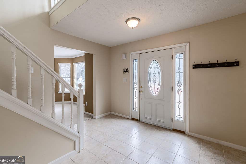Photo of 2167 Pixie Rose Lane, Loganville, GA 30052 (MLS # 10810345)