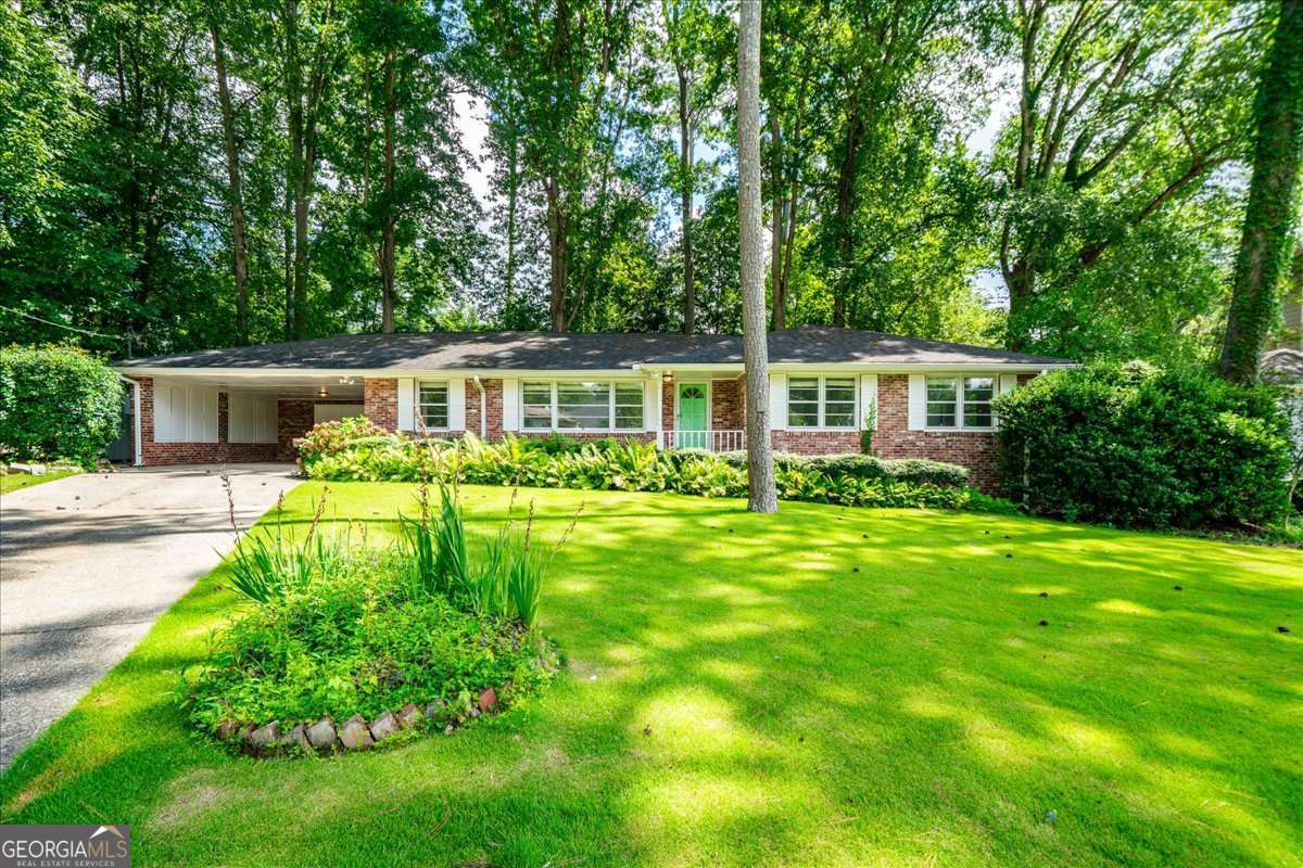 Live in one of Atlanta's most desirable neighborhoods in this fully renovated home in top rated Oak Grove School District! This all brick ranch home features 3 bedrooms, 2 bathrooms and sits on a quiet cul-de-sac. You'll love the brand-new kitchen and bathrooms, freshly refinished hardwood floors, with a functional layout. Enjoy a private, fenced-in backyard. Great for pets, play, or relaxing dinner on your patio. Covered carport with space for 2 vehicles and laundry/mudroom. Kitchen appliances are included; tenants bring their own washer/dryer. Pet friendly with a separate pet fee. Located in an established neighborhood with easy access to I-85, Emory, CDC, and Toco Hills, this home offers convenience and comfort in one package! Apply online: https://apply.link/iBWl4JI