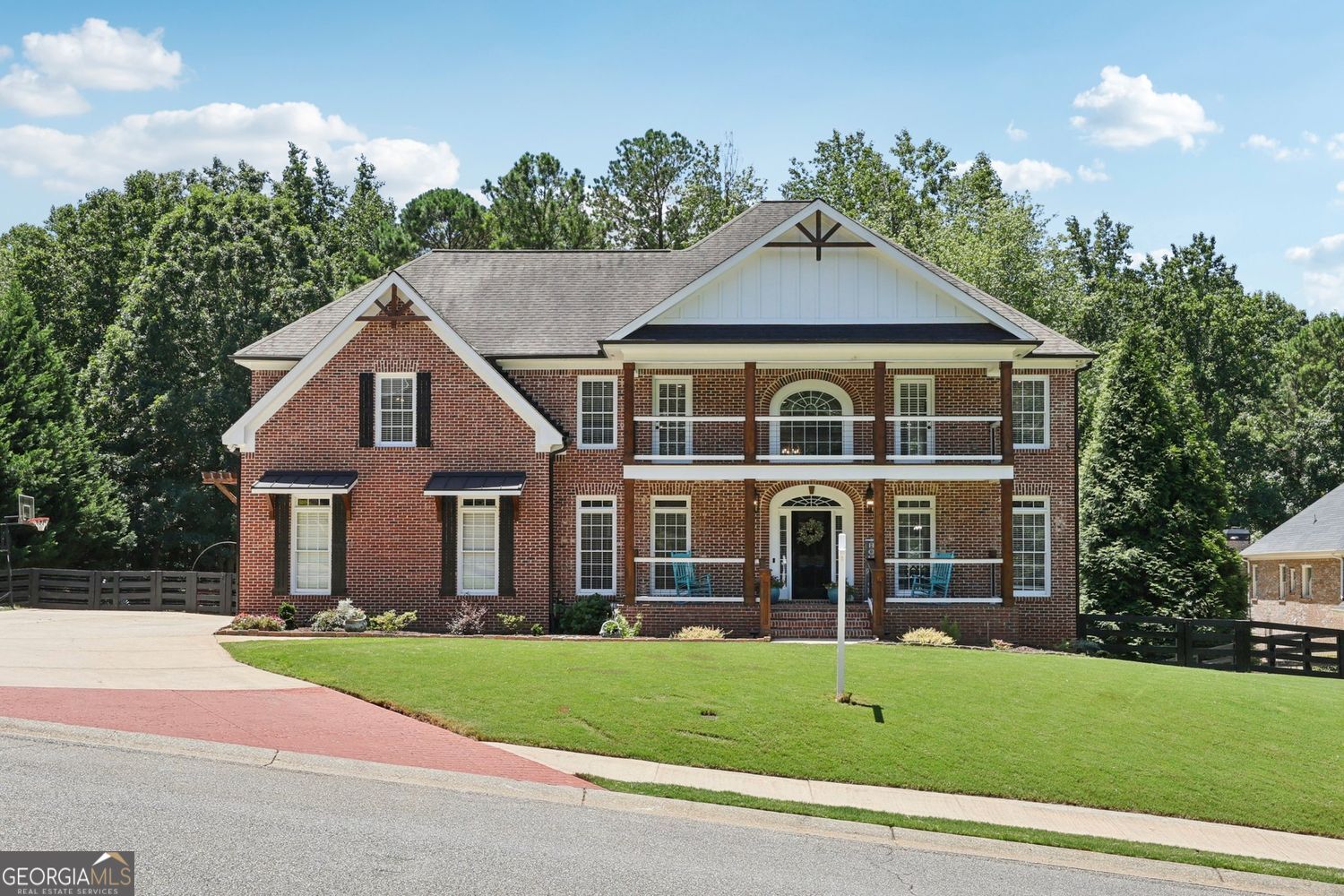 No HOA Restrictions! This stunning 7 Bedroom/7 Bath Remodeled home has 3 Car Garage, 4 sides brick, Guest suite on Main w/full bath, Oversized Covered Deck, Finished Terrace Level w/ In-law/Teen Suite w/Separate Gourmet Kitchen and fabulous renovations throughout - every detail thoughtfully updated for modern living. Situated on a large, level 2.64-acre lot - the biggest in this exclusive 27-home subdivision - this property is pool-ready and designed for entertaining. Enjoy upper and lower covered porches with an under-gutter system, all overlooking your backyard oasis complete with playscape, fire pit, handcrafted man shed (with electricity and water), BBQ pit for smoking meats, and a walk-up outdoor bar area. Chef's designer kitchen w/all stainless steel appliances, dual ovens, oversized island and quartz countertops opens to a cozy breakfast nook and spacious living room, with every rear window framing beautiful views of the entertainer's backyard. The formal dining room easily seats 20+, while the large front sitting room is perfect for a grand piano or flexible office space. The main level features gorgeous, refinished hardwoods, a generous guest suite with a private bath. Upstairs, the expansive primary suite includes access to a front patio, an oversized renovated bathroom with a spa-like walk-in shower, a freestanding soaking tub, and an enormous custom closet. Three additional upstairs bedrooms each have large private en-suite baths and ample closet space. The upstairs laundry room includes a sink and custom shelving for added convenience. The fully finished basement offers endless possibilities - use it as an in-law suite, teen suite, or full 2-bedroom, 2-bath apartment. It includes a spacious open kitchen with top-of-the-line appliances and finishes, a craft room, a second laundry room, storage, and a large secondary primary suite with a private bath. This exceptional property truly has it all - privacy, space, luxury, and no HOA restrictions. A must-see!