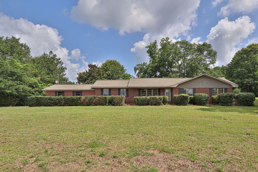 Priced to sell! Be the second family to live on this beautiful 53 Acre Homestead. With rolling pasture land, established trees and Vineyard Branch at the back of the property, you've found the space to stretch out and the land you've dreamed of. The 3 bedroom 3 bathroom home is waiting for you to put your personal touch on the interior. The home and existing structures are being sold as is. Septic system is in place, there is a Private Well and Public Water connection. The home faces Rock Mills Rd and the acreage touches CR-91. Schedule an appointment to see this property today!