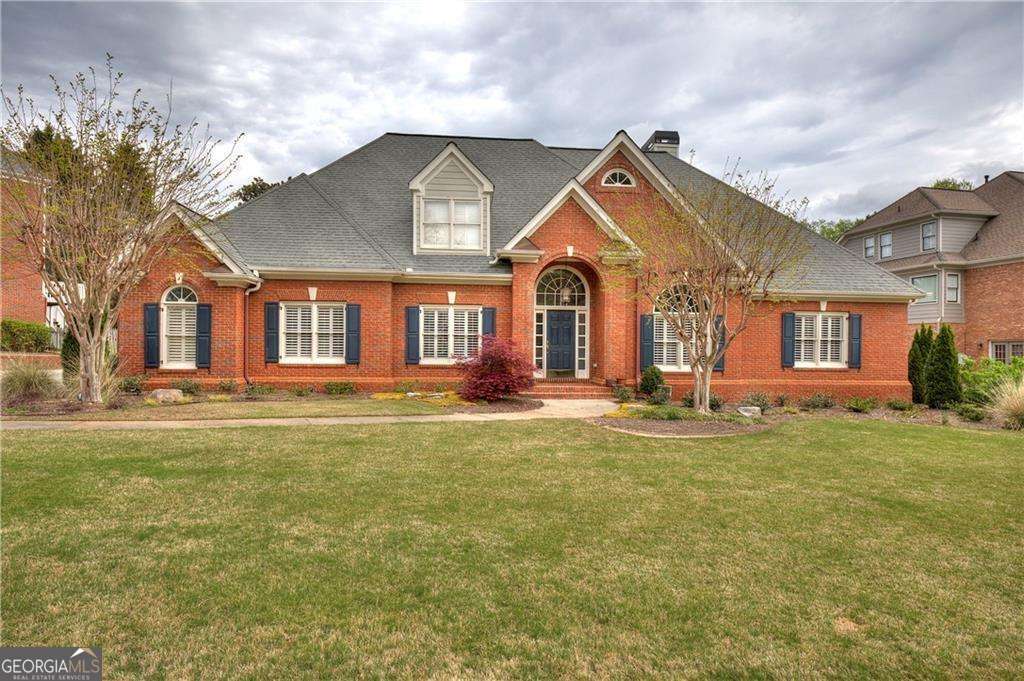 Welcome to 718 First Cotton Drive, where comfort meets classic charm in the heart of Powder Springs! Located in the always-popular Browns Farm neighborhood, this beautifully maintained 4-sided brick ranch home offers the perfect layout for everyday living and easy entertaining. With 4 large bedrooms and 3 full baths, there's room for everyone whether you're hosting for the holidays or just enjoying a quiet night in. Inside, you'll find sun-filled living spaces thanks to 17 brand-new Energy Star windows that not only bring in tons of natural light but also help keep energy costs down. The front formal dining room and dedicated office or den offer flexible space for work or play, while the spacious living room features built-in bookshelves and a cozy gas fireplace. It flows right into the open kitchen and breakfast area, where you'll find plenty of counter space, a big walk-in pantry and a laundry room tucked just around the corner. Step outside and you'll love the peaceful backyard and patio perfect for summer barbecues, morning coffee, or just kicking back after a long day. The 3-car garage gives you all the storage you need for cars, bikes, tools and more. Living in Browns Farm means access to awesome neighborhood amenities like a pool, tennis courts, playground, and even basketball and volleyball courts-all within walking distance. You're also just a short drive to downtown Powder Springs, the Silver Comet Trail, Lost Mountain Park, and plenty of shops and dining options. Top-rated schools and convenient access to major highways make this an easy choice for anyone looking to put down roots in a friendly, established community. This home truly checks all the boxes - don't miss your chance to make it yours! Preferred lender offering $5,000 towards closing costs and grants available up to $20,000.