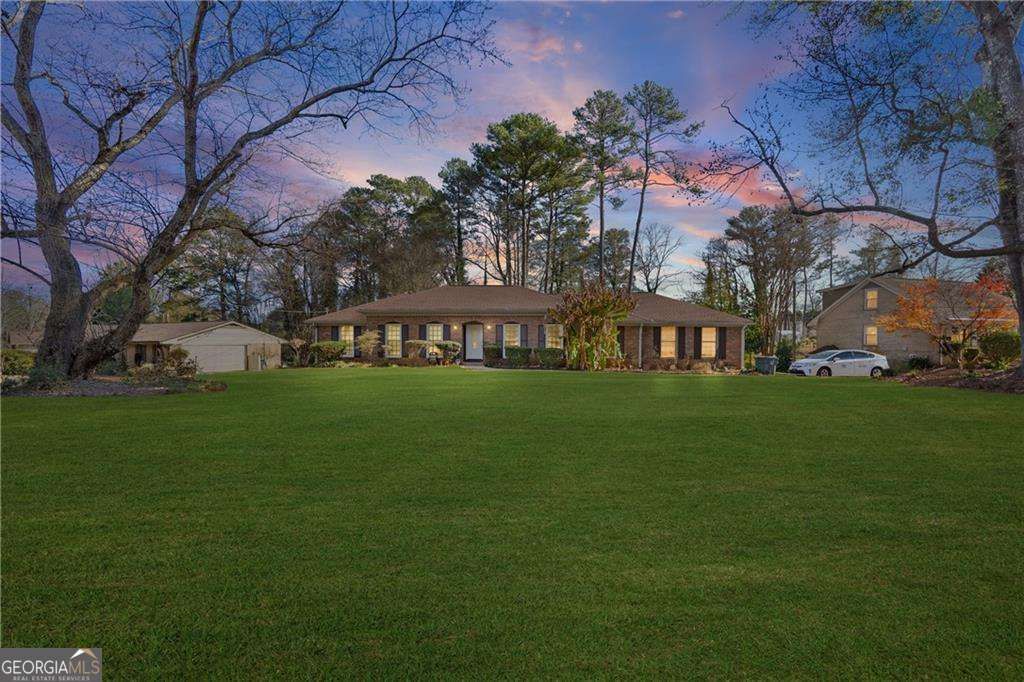 Photo of 724 Rebecca Street NW, Lilburn, GA 30047 (MLS # 10666650)