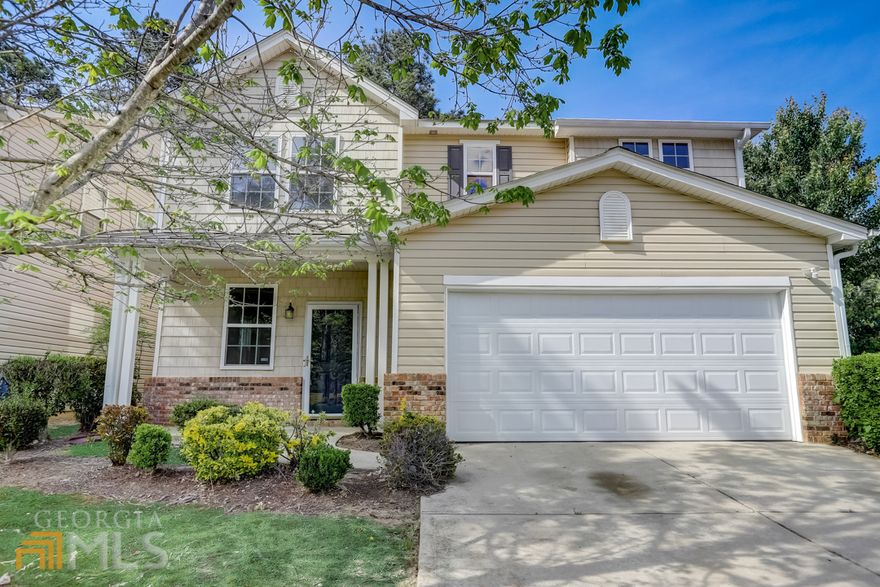 This traditional two-story home sits on a corner lot. Equipped with a private, wooded backyard, front porch, and back patio area. Double vanity in the master bathroom located on the upper level along with three other bedrooms and a full bathroom; half bathroom located on the main level. The first story has an open floorplan with a eat-in kitchen that comes with stainless steel appliances, including a french door refrigerator, and clean white cabinetry . Vinyl flooring and soft carpet throughout the home. Schedule your showing today to see if this home is right for you.