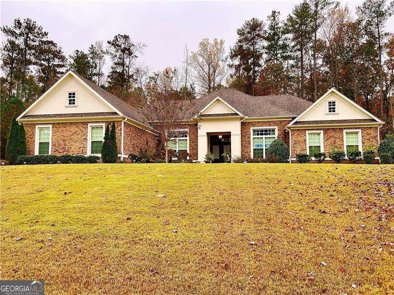 Beautiful Completely Stepless 6 years New Ranch shows like a model. Guests Marvel at How Large the Rooms Are in This This OPEN Plan Home! Impressive large Island in Entertainers Kitchen has Granite Countertops, Upgrade Stainless Steel Appliances, Gas Cooktop, Double Oven.This Open Plan Kitchen with a HUGE walk-in Pantry overlooks Large Family Room with Coffered Ceilings, Builtins and wall of windows, 14 Foot Ceiling in all Main Living Areas. Very Large Primary Suite with impressive Large Bath and Customized Walk-in Closet. King sized Guest Bedrooms with Ensuite Baths, Separate Half Bath.Completing the main level is a Ex-Large Living Room and Pool Table-sized Dining room with custom picture frame molding, Media Room with Bar area. Don't Miss the Huge Walk In Coat Closet! Laundry Room with Sink. Custom Home is neutral, move in ready. Hardwood Flooring in all main living areas, Custom Upgrade Lighting. Very private Patio, Side Load garage, plus loads of extra parking and additional parking pad. Corner Wooded Private Premium Lot!! All in a beautiful and active swim, tennis, clubhouse and playground community! This is a MUST SEE!If You're Looking for Modern One Level Living This is it!
