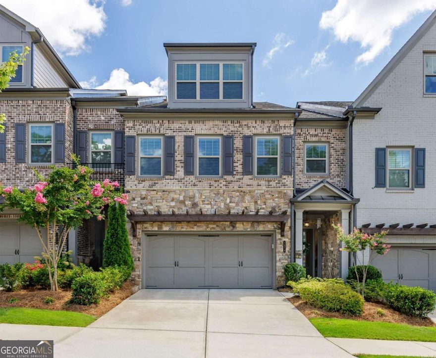 The fantastic combination of ample space, updated finishes, community amenities and location makes this beautiful townhome the most compelling value in Alpharetta!  3 nicely finished floors with over 3,600 sq ft (all above grade) and the 2-car garage located on the main level, which has high ceilings and an open floorplan.  Elevator ready with 3 additional large closets that provide tons of storage space. The 2nd floor has 3 bedrooms, including the master suite with a sitting room and direct access to the laundry from the master closet. The 3rd floor has another bedroom and a huge recreation room that provides a variety of options.  You'll love the amenities in Harlow with 2 pools, clubhouse, tennis courts, walking trails, dog park and lots of level lawn space. You can't beat the short drive to the active portions of Alpharetta & Roswell, easy access to GA400, and a quick walk to enjoy concerts at Ameris Bank Amphitheatre without the hassle of parking.  Harlow East is one of the most sought-after communities in North Fulton because of its spacious & updated townhomes, sociable amenities, excellent schools and ideal location!