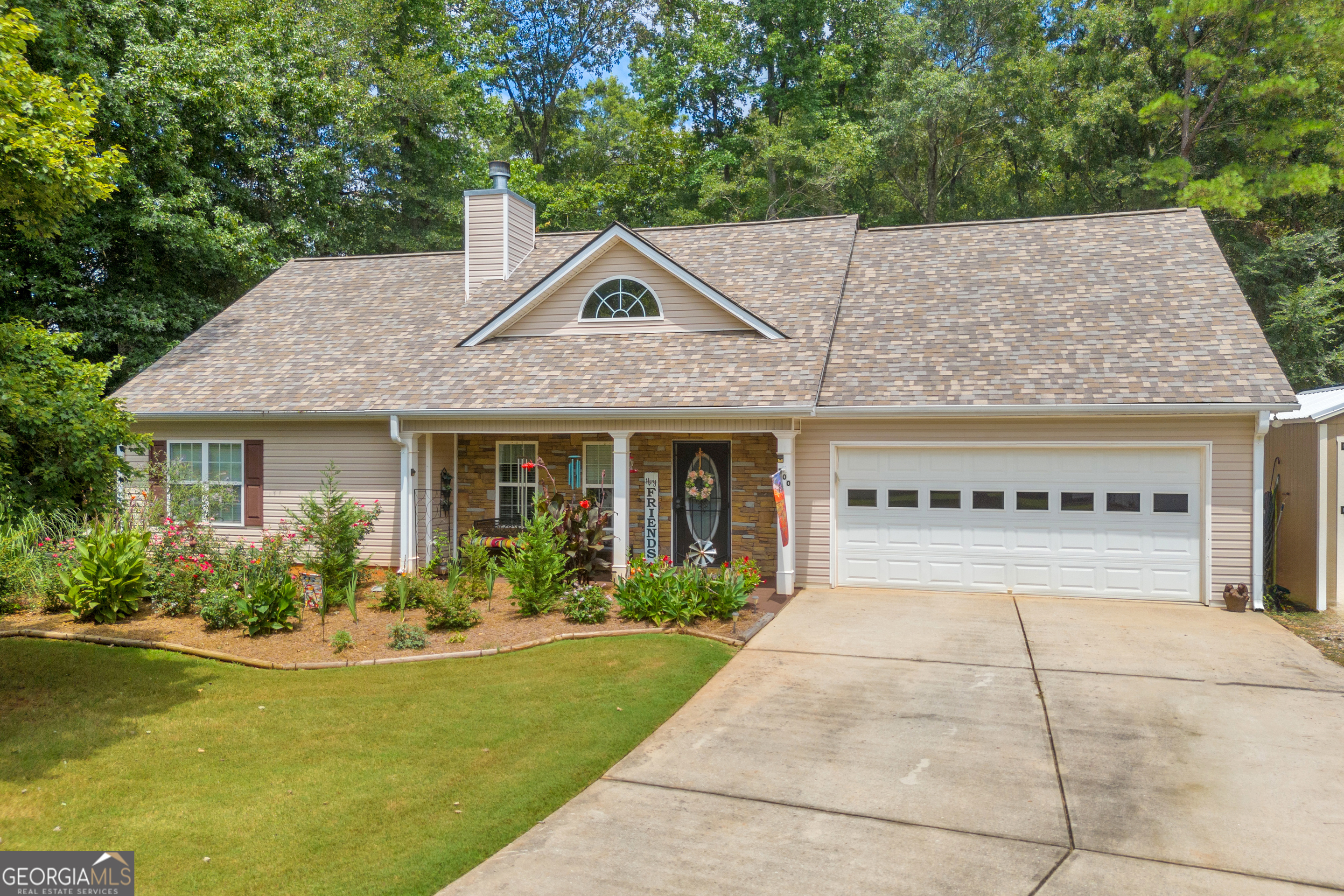 Welcome to 800 Evergreen Drive, Monroe, GA - where comfort meets charm! Step inside this inviting 3-bedroom, 2-bath home and feel right at home. With 1,922 sq ft of thoughtfully designed living space, this home offers a warm and open layout perfect for everyday living and easy entertaining. The spacious living room welcomes you with natural light and plenty of room to relax. The kitchen features ample counter space and cabinetry, making meal prep and gatherings a breeze. The primary suite is a peaceful retreat, complete with its own private bath and walk-in closet. Outside, enjoy the large backyard - ideal for family barbecues, pets, or just soaking in the quiet neighborhood setting. Nestled on a 0.38-acre lot in a friendly community, you're only minutes from shopping, dining, and schools. This home has everything you need to settle in and make memories - all it's missing is you!