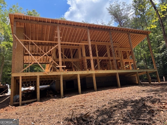 Under Construction. A modern Log Home nestled in the wooded development of Heatherwood. Toccoa River access for the Heatherwood development. Aska Adventure Area, tubing, kayaking, hiking and biking trails nearby. This new modern log home will feature 2 bedrooms, 2 bathrooms with tub and tile surround, master tile shower, 2 fireplaces (one indoor and one outdoor), wood floors, and so much more!