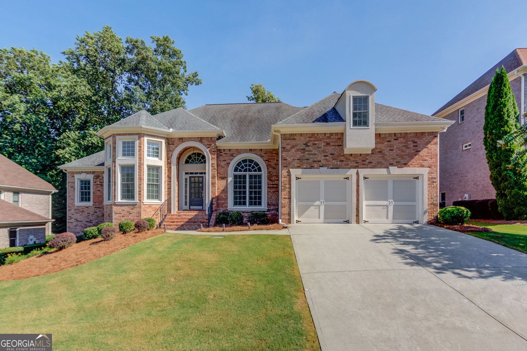 Photo of 2640 Ivy Brook Lane NE, Buford, GA 30519 (MLS # 10830189)