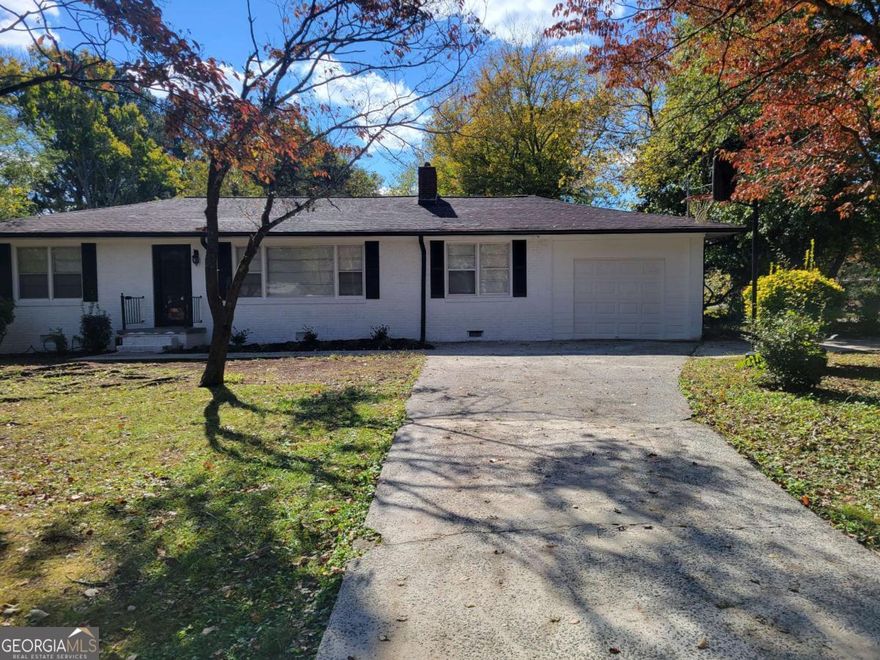 TOTALLY RENOVATED & MOVE-IN READY!!! Welcome home to this beautifully updated ranch-style gem in the heart of Marietta! This home has been completely renovated from top to bottom-freshly painted inside and out, featuring brand-new appliances, ceramic tile bathrooms, and luxury vinyl plank flooring in the kitchen and one bedroom, complemented by gorgeous hardwood floors throughout. The modern kitchen offers granite countertops, and white cabinets. Located in a quiet, established neighborhood, this home offers easy access to I-575, I-75, shopping centers, restaurants, and Kennesaw State University. Don't miss this opportunity-this stunning, move-in-ready home won't last long!