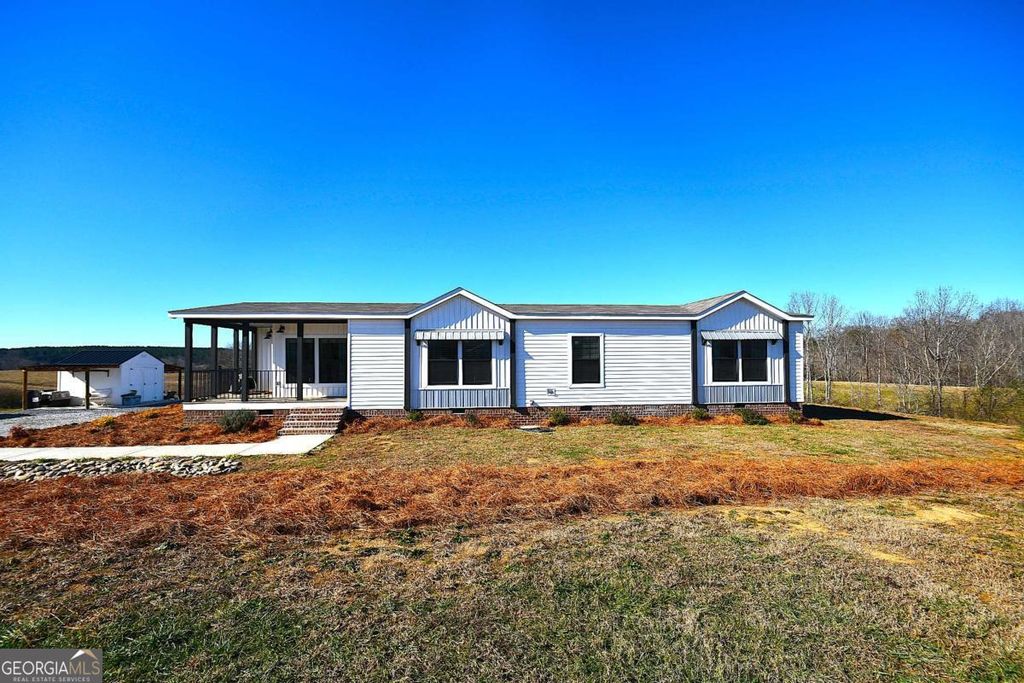 Photo of 703 Addison Road, Buchanan, GA 30113 (MLS # 10660615)