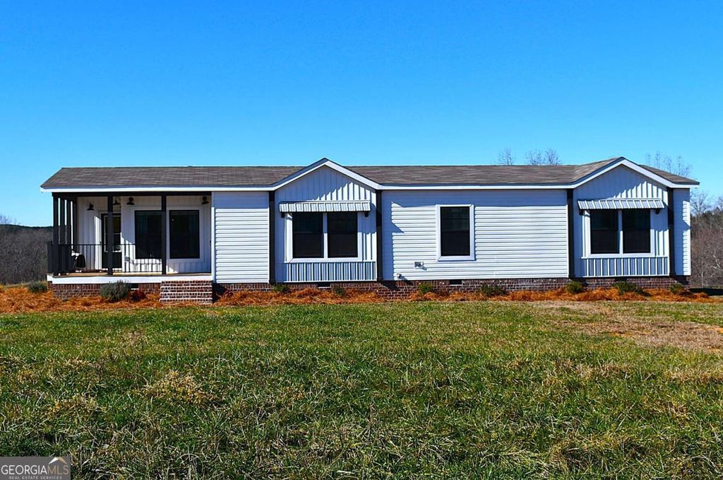 Photo of 703 Addison Road, Buchanan, GA 30113 (MLS # 10660615)