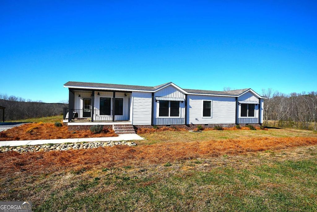 Photo of 703 Addison Road, Buchanan, GA 30113 (MLS # 10660615)