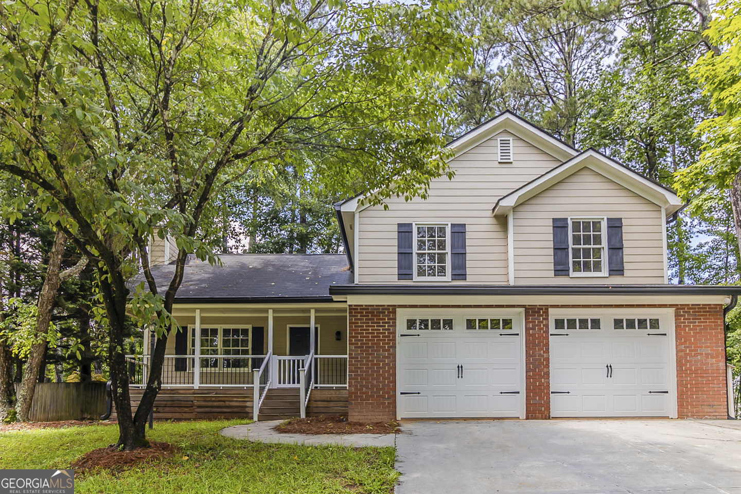 This charming 3-bedroom, 2-bath home features fresh interior paint, stylish new light fixtures, and beautifully painted kitchen cabinets for a modern touch. Enjoy the inviting front porch, perfect for relaxing evenings, and the convenience of a 2-car garage. The spacious primary bedroom boasts vaulted ceilings, adding an airy, open feel.