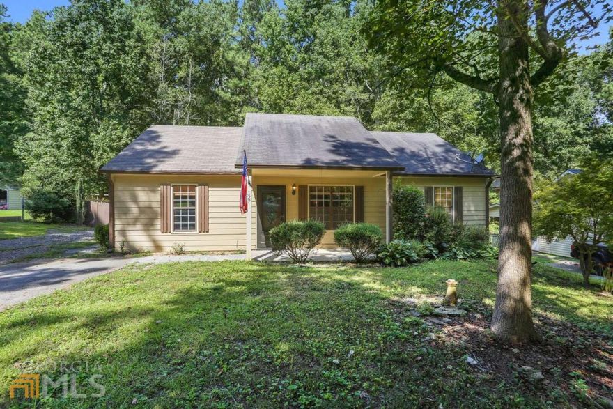 Don't miss out on this adorable cottage in the desirable city of White, GA! No HOA! This true ranch home has 3 bedrooms and 2 full baths with a split bedroom plan and fantastic closet space! Newly installed laminate flooring and fresh paint throughout. Enjoy the serenity of your private backyard with nearly new split rail fencing and a covered patio area for entertaining.