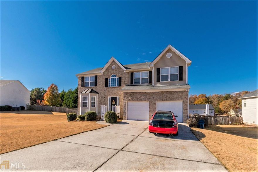 Beautiful two story home with plenty of space. Large kitchen with Granite Counters and view to back yard. Large Formal Living Room and Dining Room great for entertaining. Open Family room with fireplace and half bath on main. Larger Owner Suite with sitting area or office. Dual vanity with tons of counter space. Finished Basement with great space for theater/bar area, Unfinished area great for storage. Archer High School & Close to shopping and dining!