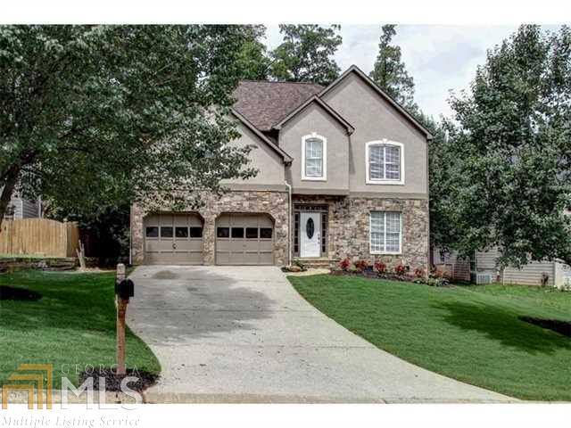 Tired of watching your dream home on HGTV? This is a rare opportunity to live your dream in highly sought after Cobb County, at an affordable price. NEW, NEW, NEW is the only way to describe this one that has been tastefully remodeled to the highest standards. The photos speak for themselves. Entertainers dream floor plan, with tons of space both inside and out to enjoy with friends/family. You will love the kitchen with huge island, beautiful wood cabinets, designer backsplash, granite & new appliances. Newly refinished hardwoods,.... the list goes on. Will not last.