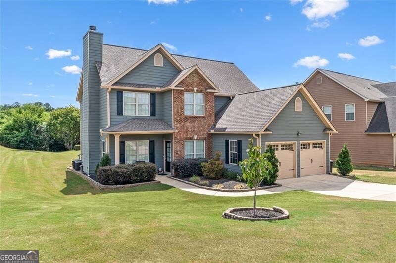 Sitting on one of the largest and most incredible corner lots in the popular Hamilton Crossing neighborhood, this beautifully - and completely updated - 4 bedroom, 3 full bathroom home offers the perfect mix of modern comfort and timeless charm. This increasingly uncommon floor plan features a full bedroom and full bathroom on the main level - ideal for guests, multi-generational living, or a private home office! There is also plenty of flex space with a large eat-in kitchen that is perfect for a more casual dining room, or used as a roomy keeping room! Then there is another large flex space off the living room that is perfect for a kid's play room, office space, sitting room, or a more formal dining space. Aside from having a ton of natural light, the home has been lovingly updated from top to bottom, boasting new flooring, fresh light fixtures, updated bathrooms, 5 year old (30 year architectural) roof, and a stunningly reimagined heart of the home! The kitchen features solid quartz countertops, expanded kitchen island with tons of room for barstools, tall cabinetry, less than a year old stainless steel appliances, and a huge walk-in pantry - absolutely perfect for busy daily living or full on entertaining! Upstairs there is an oversized owners suite, giant walk-in closet, immaculate owners bath, two additional bedrooms, and another completely overhauled full bathroom! Back outside, you'll find a newly covered patio, perfect for enjoying your morning coffee or hosting gatherings, and a large storage shed that is included in the sale! And being one of the largest lots in Hamilton Crossing and backing up to woods, this property allows ample outdoor space for recreation, gardening, private pool, hot tub, play set, or just taking in all that green space. Located just steps from the neighborhood pool, playground, and local parks right around the corner, this home delivers the ideal blend of immaculate move-in ready condition, peaceful established neighborhood lifestyle, prime location convenience, and easy living!