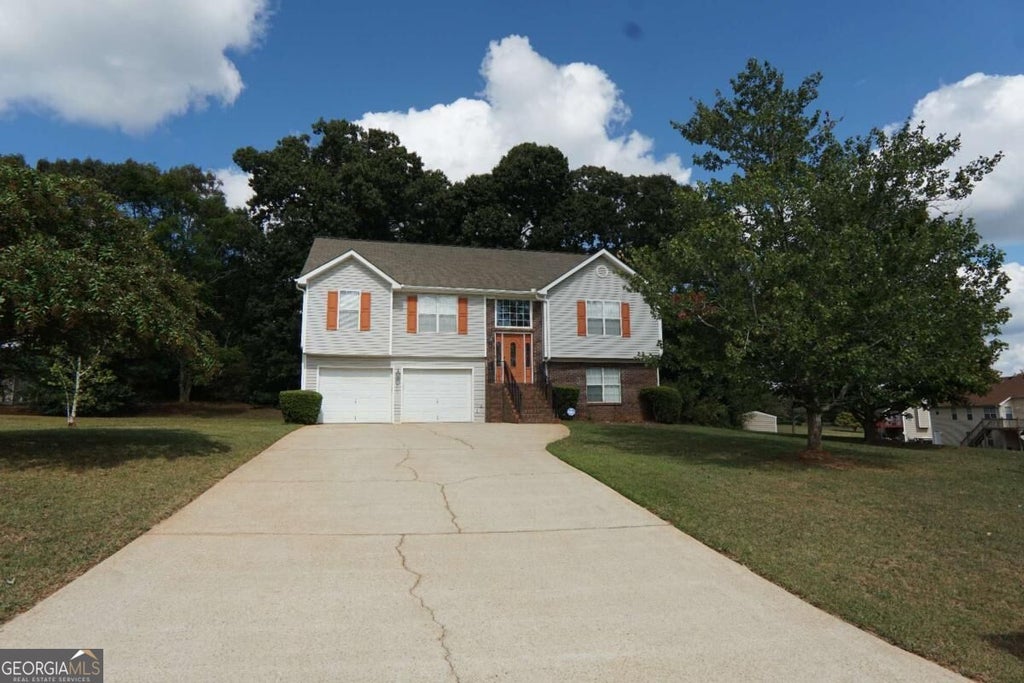 Photo of 3806 Clayton Crossing Way, Ellenwood, GA 30294 (MLS # 10858308)