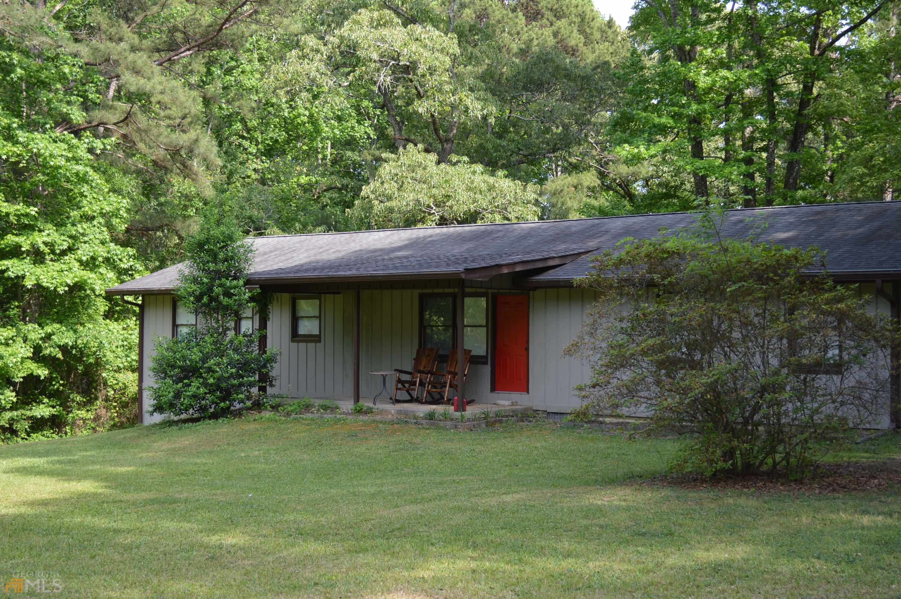 3 bedroom 2 bath ranch with 2 car side entry garage sits on 2.28 acre private lot. This home offers a great room, laundry room, spacious kitchen with ample cabinets, refrigerator, dishwasher, built in microwave and range. This home is minutes from everything - shopping, dining, recreation and easy commute to Newnan, Peachtree City and I85. Non smoking homes. Pets considered with a non refundable pet fee.