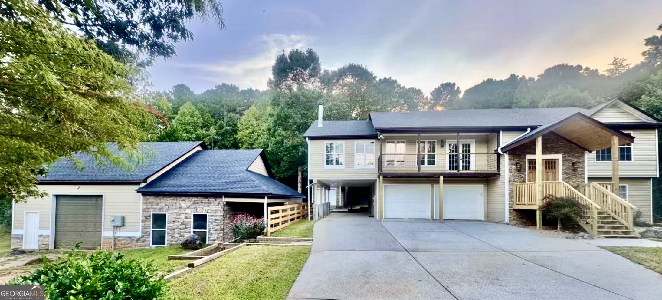 This Is a must see! Your new front and back porches, complete with hog fencing, suggest a charming and rustic touch, perfect for both curb appeal and privacy. The covered porch areas-are invites for relaxed gatherings or quiet reflection. Your Master eat-in Chef's kitchen, featuring Napa Taj Mahal quartz, offers a sophisticated blend of elegance and function~ accentuated with tongue-and-groove cathedral ceilings with red structural beam carries throughout your open floor plan of the living-room and dining area. Taj Mahal quartzite is celebrated for its creamy white base with delicate taupe and gold veining-adding a luxurious, timeless aesthetic to any kitchen. It's highly durable, and increasingly popular for its stunning yet versatile look Retreat to your newly renovated master bath with a soaking jacuzzi it complements the luxurious feel of the kitchen, meanwhile, your back covered porch and balcony, designed for entertaining and relaxation, are functional extensions of your indoor comfort and style. Basement Suite & Versatile Outbuildings The downstairs is perfect for an in-law or teen suite, enhances the home's functionality with two bedrooms and a full bath. Additionally, a detached she-shed for garden storage and an expansive detached workshop-with potential to be transformed into a two-story carriage house or a superb business space-adds impressive flexibility and value to the property. Schedule through Showing Time!