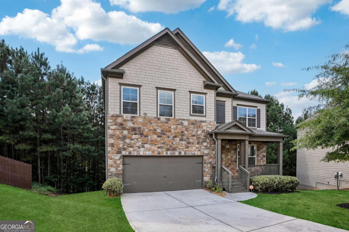 Welcome to this stunning 5-bedroom, 3-bathroom home in highly sought after Forest Park subdivision! Built in 2018, this "better than new" 2,476 square-foot residence combines modern style with comfortable living. The home features a spacious, open-concept layout, perfect for entertaining and daily life. The kitchen is a chef's dream, boasting an oversized kitchen island and sleek stainless steel appliances that complement the design. The space flows seamlessly into a large, inviting living area, making it easy to host gatherings. The main level also features a full bathroom and a versatile bedroom, ideal for guests or a home office. Upstairs, the expansive primary suite awaits, offering a tranquil retreat with an ensuite bathroom and a walk-in closet. Three additional well-sized bedrooms and another full bathroom provide plenty of space for all of your needs.