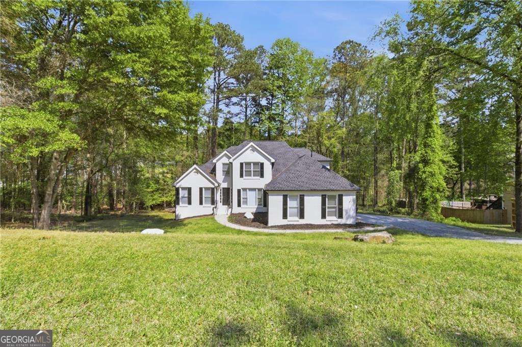 Photo of 3760 Mountain Cove Road, Snellville, GA 30039 (MLS # 10733759)