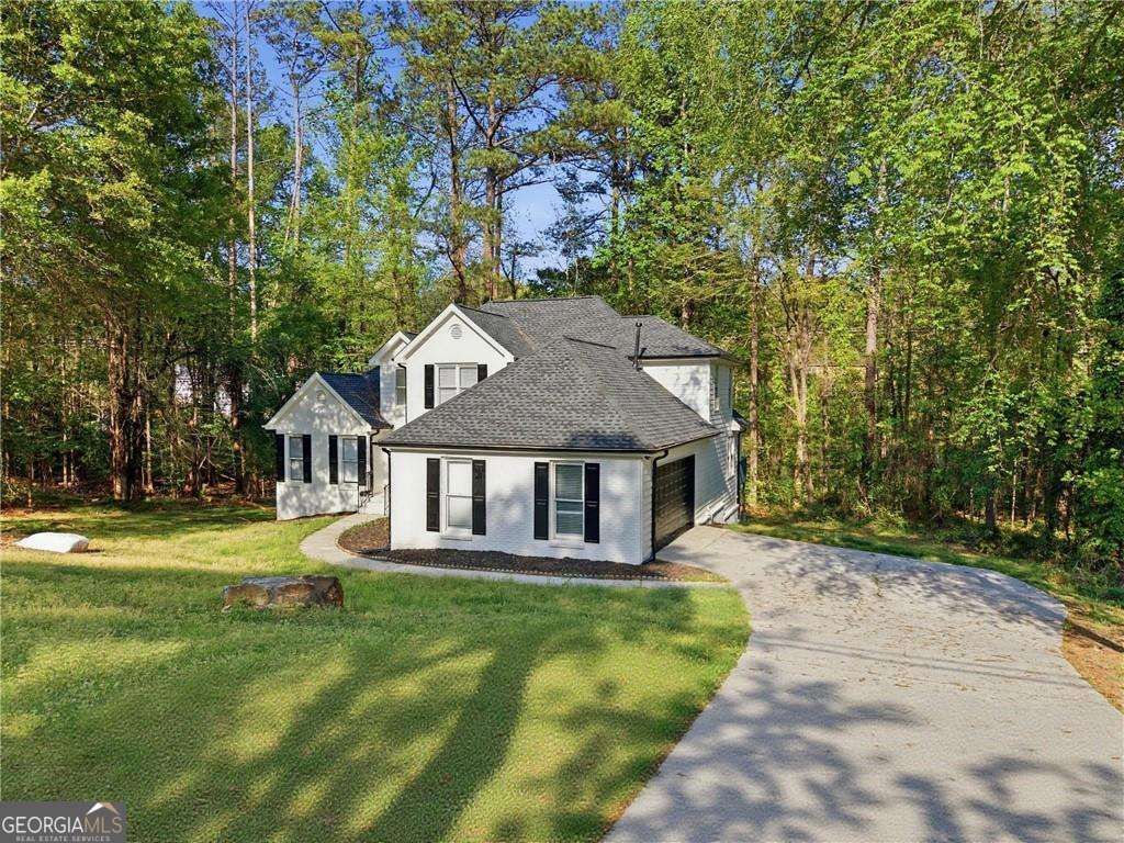 Photo of 3760 Mountain Cove Road, Snellville, GA 30039 (MLS # 10733759)