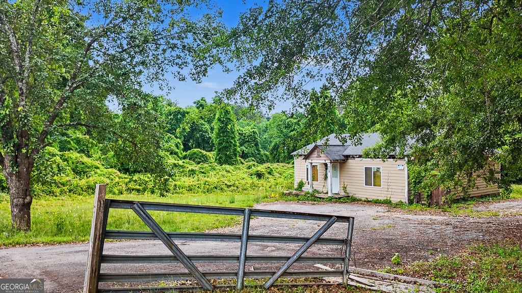 Photo of 959 S Hairston Road, Stone Mountain, GA 30088 (MLS # 10838633)