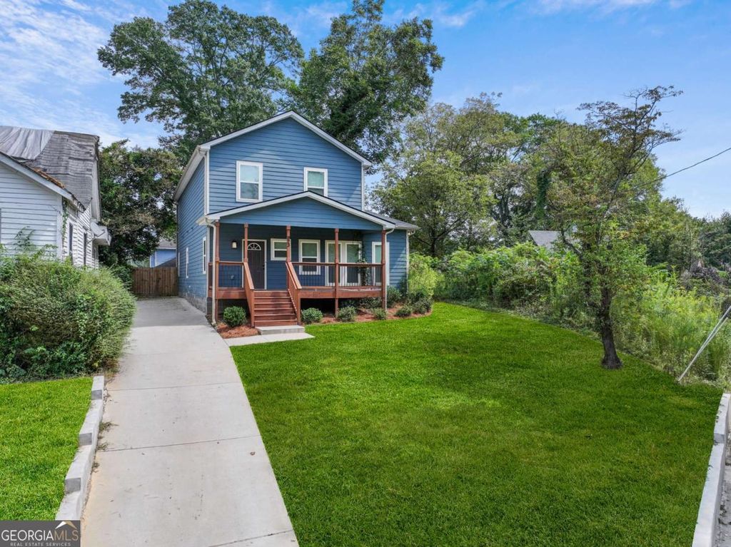 Photo of 973 Mayson Turner Road NW, Atlanta, GA 30314 (MLS # 10671167)