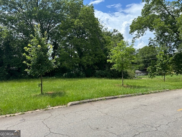 Builders Special Large Corner Lot Near Downtown Could be divided build two Homes Close to Down Community Grant potential