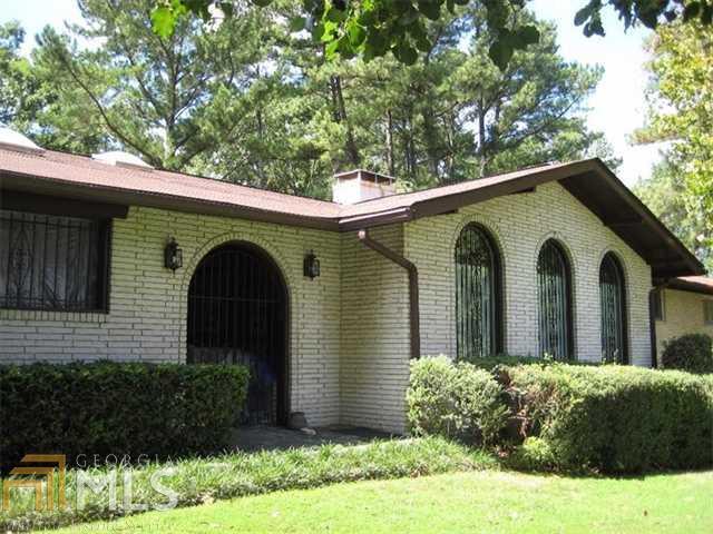 Spacious Contemporary Ranch with Full Finished Daylight Basement. Three large bedrooms and two double vanity baths on the main level, two bedrooms, bath, wet bar and large living area downstairs. The home has hardwood floors though out and large space great for a home office or gym. Large corner lot with a beautiful established back yard. Conveniently located, close to I-85 and I-285, Downtown, Emory, and The CDC. Sought after Lakeside High School.
