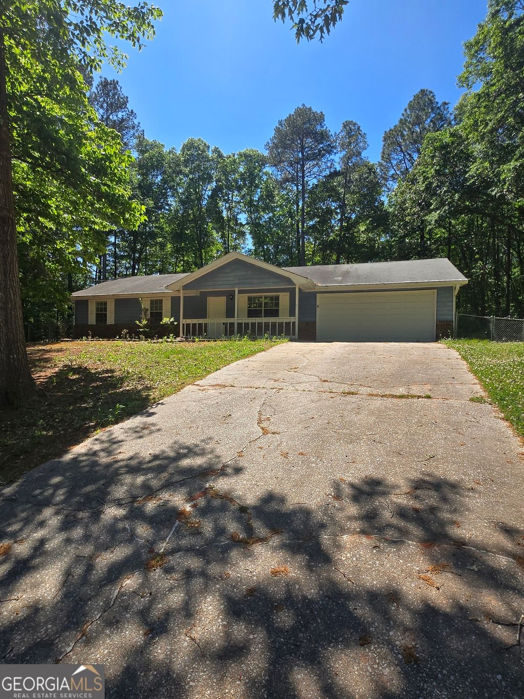 Photo of 125 E Country Woods Drive, Covington, GA 30016 (MLS # 10761454)