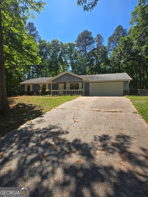 Photo of 125 E Country Woods Drive, Covington, GA 30016 (MLS # 10761454)