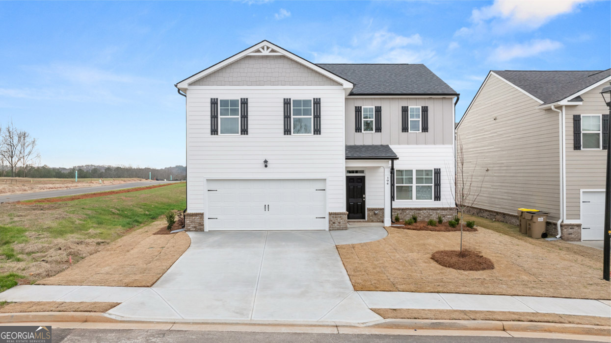 Gorgeous & Private Homesite! In Jackson County's newest Premier Master Planned Community with incredible amenities! RESORT style community! Twin Lakes is only 2 miles from I-85, 5 minutes to Downtown Hoschton/Braselton with their quaint shops, restaurants and local brewery. Newer sought after Jackson County Schools! SPECIAL FINANCING! Estimated completion March/April 2025. The GALEN floor plan is an affordable 4 bedroom, 2.5 bath Two-Story home with the Owner's Suite on the 2ND floor and a large rear COVERED patio in a master planned community of TWIN LAKES with AMAZING AMENITIES: POOL - CLUBHOUSE - FITNESS CENTER - PLAYGROUND - DOG PARK, LAKESIDE PAVILION and WALKING TRAILS to bike or stroll around the serene onsite LAKES. Home seekers will love this brand new home in a premier master planned resort community with gorgeous tree lined and cart pathways. Kitchen features GRAY cabinets with Quartz countertops and stainless steel appliances. Hardwood floors on 1st floor except bedrooms & baths. Relax and enjoy your coffee in the morning, or a glass of wine with friends in the evening while grilling on your private patio. Total Price includes 2 zone lawn irrigation system, window blinds, 2 ceiling fans, architectural shingles, 4 sides brick water tables, etc. Smart Home connected. Jackson County's newest Premier Master Planned Community. Ask about the FREE 10 year warranty through RWC with this home! Twin Lakes is only 2 miles from I-85, 5 minutes to Downtown Hoschton/Braselton with their quaint shops, restaurants and local brewery. Northeast Georgia Medical Center is only 15 minutes away and Chateau Elan Winery and Golf Club is just 10 minutes away! NEW PUBLIX Supermarket is at the front entrance to Twin Lakes off Highway 53. Stock Photos used.