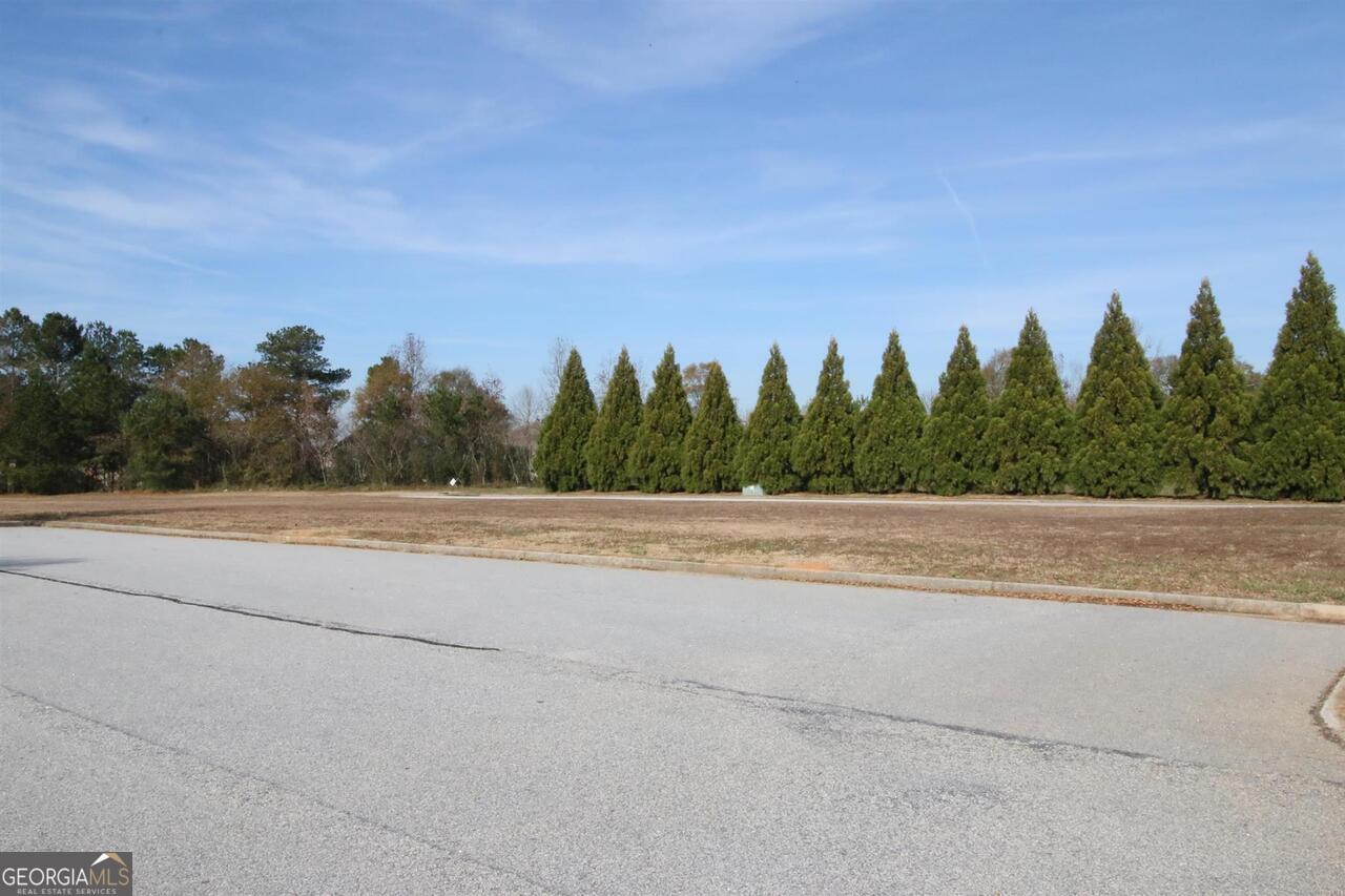 16050 sq ft developed lot in Judah Crossing condo development. This lot slated for office, medical, or retail development or Athens Hwy. All utilities in place. Ready to build.